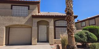 Two story 2 bedroom townhome with newer flooring, paint & appliances - community pool! Gallery 1