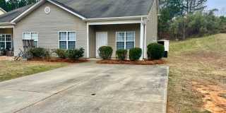 This two-story, 4-bedroom, 2-bath duplex in Fort Mill, SC sits on a corner lot Gallery 1