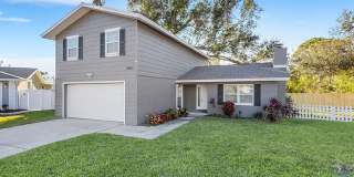 $1500 OFF SECOND MONTH'S RENT! Coastal Living Starts Here! Spacious 3BR Seminole Home with Bonus Room & Backyard Gallery 1