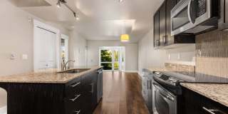 Modern 1-Bedroom + Den Condo with Parking, Storage & Rooftop Access – Marselle Condominiums Gallery 1