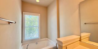**OFFERING REFUNDABLE APPLICATION FEES** Modern 2BD, 2.5BA Raleigh Home Located in Brier Creek Near Tons of Shopping and Dining Options & Within Close Proximity to RDU and RTP Gallery 12