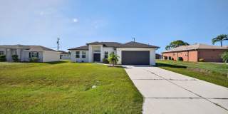 Beautiful Dream Home in Cape Coral! 4 Bedrooms, 3 Bathrooms!!! MOVE IN SPECIAL ONE MONTH FREE! Gallery 1