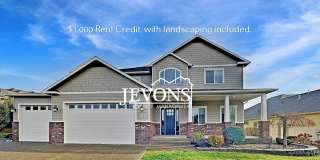 $1,000 Rent Credit - Spacious home with fully equipped kitchen, private backyard, 3-car garage, and landscaping included Gallery 1