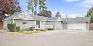 Updated Rambler with covered patio and large detached garage. Updated Rambler with covered patio and large detached garage. Gallery 1