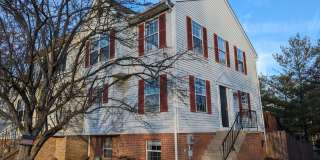 Beautifully maintained END UNIT townhouse in Robin meadows ready for your family to call home by mid April! Gallery 1