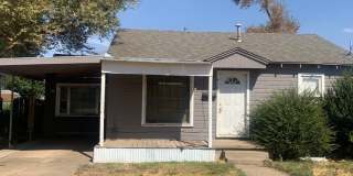 Located in Southlawn!!! 2 Bedrooms, 1 Bathroom with Carport Large Backyard with Shed Gallery 1