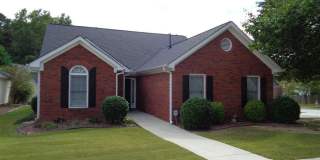 Prime Fayetteville location, 4 bed/3 full baths, close to movie studio, Senoia/PTC, lawn care included! Must see! Gallery 1