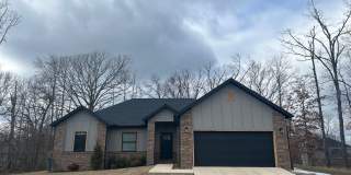 This home is a must-see in Bella Vista, offering a blend of comfort, functionality, and beauty that is hard to resist. Gallery 1