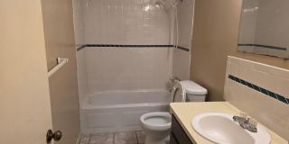 Move-In Ready 2BR/2BA Triplex with Patio & Parking in Prime Location Gallery 8