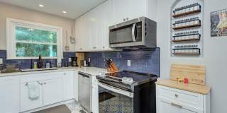 Discover this beautifully updated full brick single-family home in the heart of the historic Wesley Heights neighborhood, just minutes from Uptown Charlotte Gallery 12
