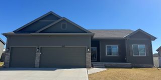 Spacious 4-Bedroom Ranch with Finished Basement  3-Car Garage Gallery 1