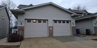 2 Bedroom 1.5 bath condo with attached garage in great NE location! Gallery 1