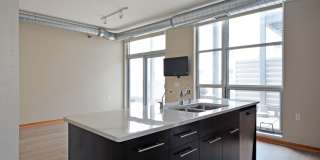 Modern 2-Bedroom Apartment with Private Patio in the Heart of Uptown Gallery 9