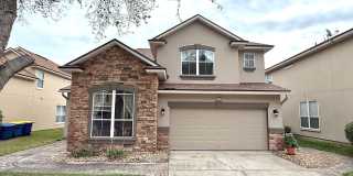 Spacious 4BR Home with Solar Panels, Downstairs Primary & Fenced Yard Gallery 1