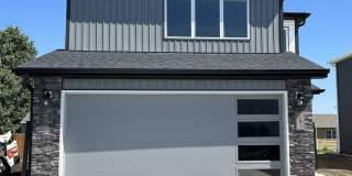 Welcome to 102 Marshall Loop,. located in the highly sought-after Moon Ridge Development in Lincoln, ND! Gallery 1