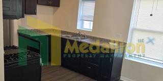 Updated 3-Bedroom Home with Sunroom and Backyard Space Gallery 9