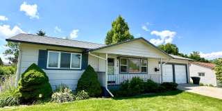 4 bed 2 bath Single Family Home with Bonus Room, Fully Fenced Yard and Double Car Garage Close to Carrol Collage! Gallery 1
