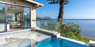 Wailupe Seaside Haven: Beachfront Luxury Home w/ Infinity Pool  City Proximity Gallery 1
