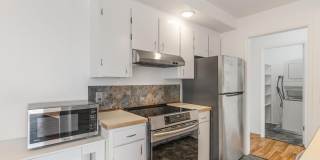 1 month free!! Sweet 1/1 condo in Lake Oswego with covered parking and storage included! Gallery 1