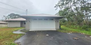 This 3-bedroom, 2-bath home in Orchidland Subdivision Gallery 1