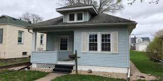 Charming 2-Bedroom Home with Basement & Backyard Storage Gallery 1