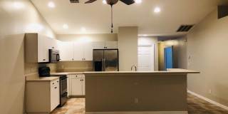 Experience this Cape Coral 3 bedroom 2 bath duplex with 1 car garage and screened in lanai. Gallery 10