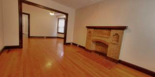 This completely refinished two-bedroom, one-bathroom home features brilliant hardwood floors throughout. Gallery 1