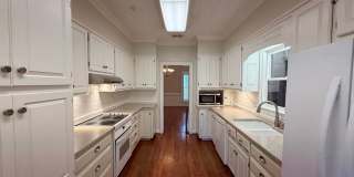 Stunning 4BR/2BA Home with Massive Bonus Room, Sunroom, & Fenced Yard! Gallery 8