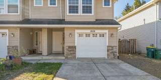 Welcome to this charming 3-bedroom, 3-bathroom home in Forest Grove! Gallery 1