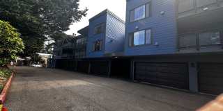 2 Bedroom 1 Bath Burien Condo 995sf, Fireplace, Balcony, One Car Garage with Storage Gallery 1