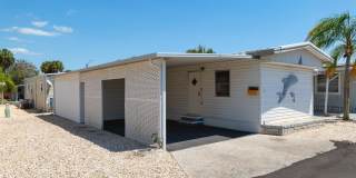 BEAUTIFUL 1 BEDROOM, 1 BATHROOM + BONUS ROOM HOME LOCATED IN THE HIGHLY SOUGHT AFTER 55+ BRADENTON TROPICAL PALMS COMMUNITY! Gallery 5