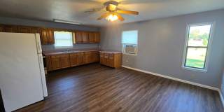 1 Bed/ 1 Bath Duplex • Partial Utilities Included • Desha Gallery 1
