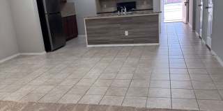 2 car garage with lighting, granite countertops. Backyard includes a custom extended concrete patio perfect for gatherings Gallery 24