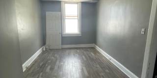 2 Bedroom + Den Home with Porch, Fenced Yard, and Water Included on Barclay Street Gallery 13