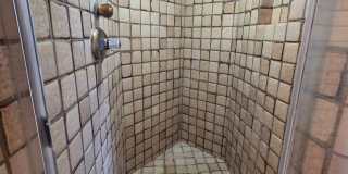 Rarely available 1-bedroom, 1-bathroom luxury apartment in the Punahou Cliffs Condominium. Gallery 12