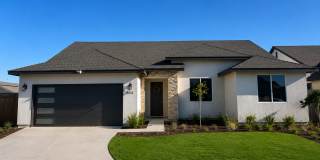 Newly Built 3-Bedroom Home with Attached 2-Car Garage, Solar Panels, Split-Wing Layout & Quartz Countertops Gallery 1