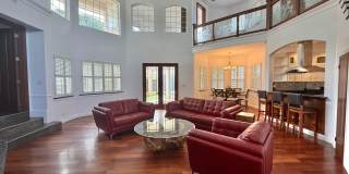 Partially Furnished 3 Bedroom / 2.5 Bathroom Custom Home in Sandhill Estates gated community! Gallery 21