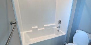 4 Bedroom / 4 bath New Townhome. Every bedroom is its own Master Suite with your own full bathroom, walk in closet and A/C unit. Full-size washer and dryer in your unit. Gallery 25