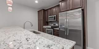 Welcome home to this beautifully maintained townhome in Mossy Oak Village. Gallery 9