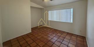Charming Home with Saltillo Tile, Arched Openings & Fenced Backyard Gallery 1