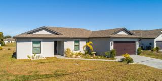 NOW AVAILABLE - 3/2 with 2 Car Garage in Mirror Lakes! Gallery 3