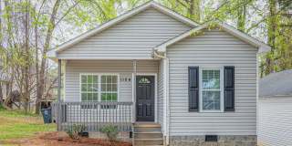 Like New Home off Freeman Mill.  Just Painted, New Wood/Vinyl Flooring, Vaulted Ceilings, Front Porch and Deck! Gallery 1