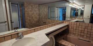 Rarely available 1-bedroom, 1-bathroom luxury apartment in the Punahou Cliffs Condominium. Gallery 11
