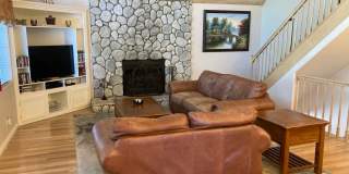 Location! Location! Terrific Four bedroom Three Bath Home with Two Car Garage including Lake Rights! Gallery 5