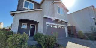 Spacious 4-Bedroom + Bonus Room with Modern Kitchen, Solar Panels & Private Fenced Backyard! Gallery 1