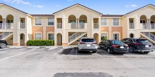 2-bath condo on the 2nd floor with a newly renovated kitchen featuring modern cabinets and granite countertops. 2-bath condo on the 2nd floor with a newly renovated kitchen featuring modern cabinets and granite countertops. Gallery 1