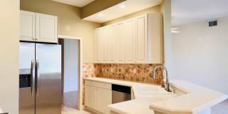Experience Bell Tower Park. GATED ground floor 2 Bed 2 Bath Den 1 Car Garage Condo. Gallery 16