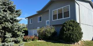 Bright and spacious split-entry home with a finished lower level, large yard, and plenty of updates! Gallery 1