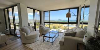 Stunning Panoramic Ocean Views! Fully furnished, fully renovated, 2 bedroom, 2 bathroom unit at Windward Passage Gallery 1