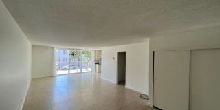 MARKETING SPECIAL - LIMITED TIME ONLY!! 2 Bedroom 2 Bath Spacious Condo For Rent in Long Beach Comes with Assigned Garage Space Gallery 1